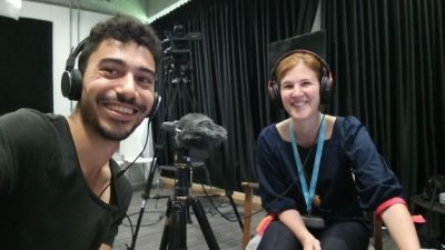 Two scientists recording a podcast